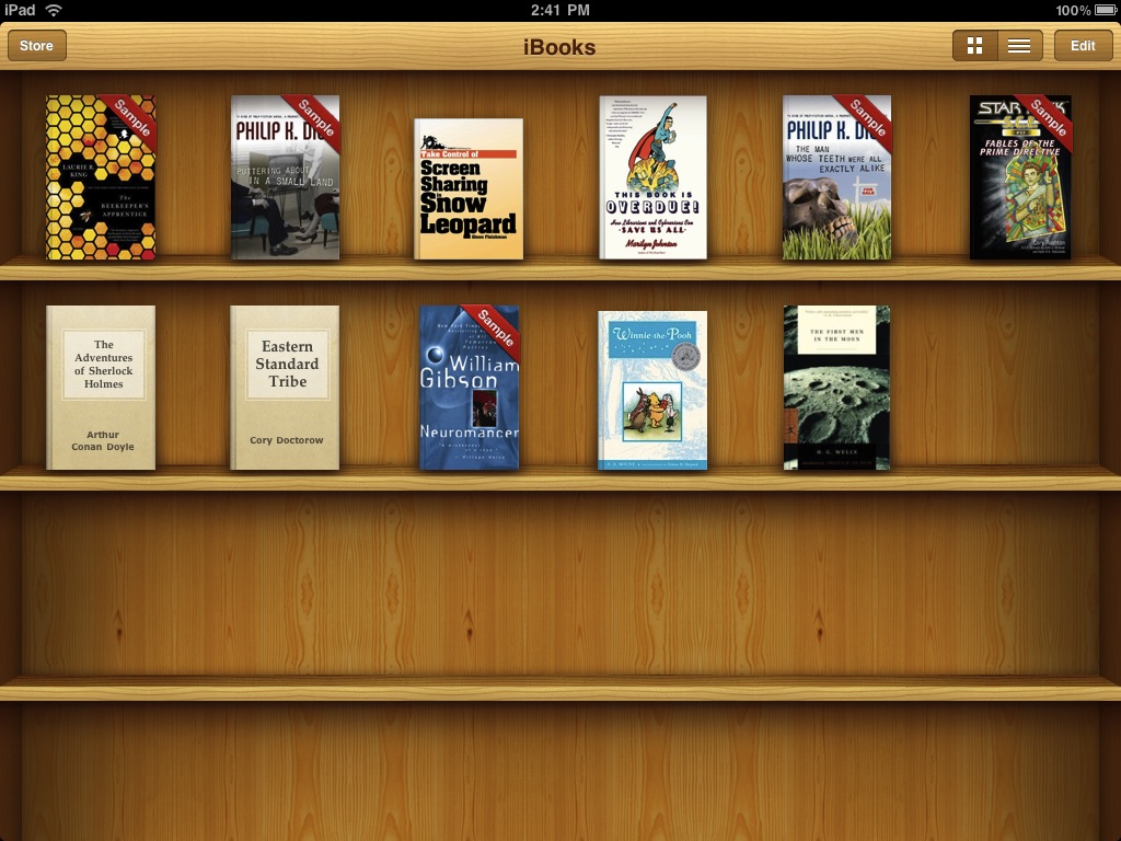 Early iBooks on iPad, with digital book covers arranged on wooden shelves